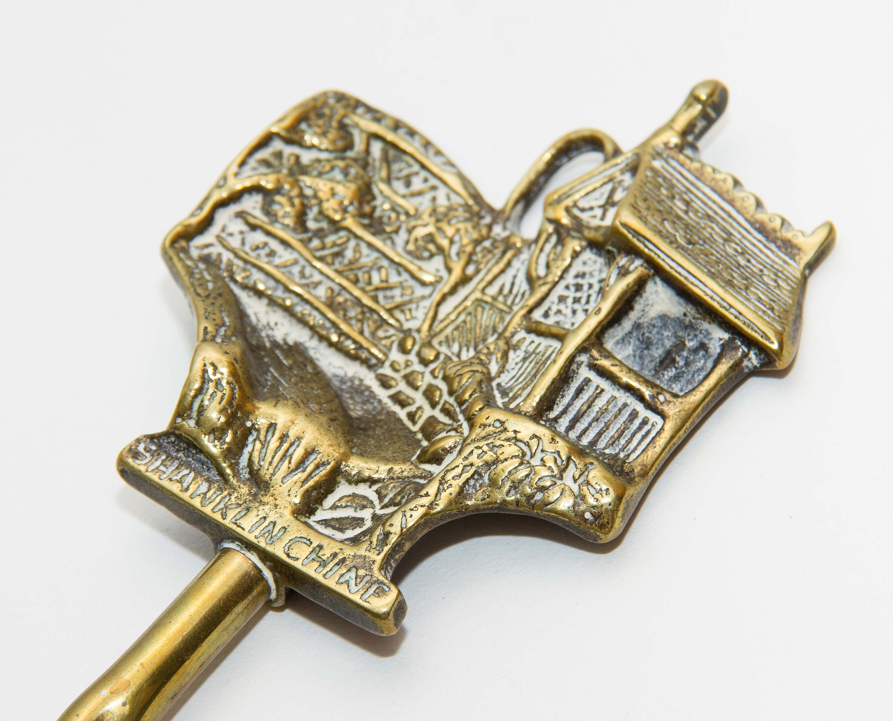 Shanklin, Isle of Wight, England brass toasting fire fork jointed ball moving end long fork Patented Registered design