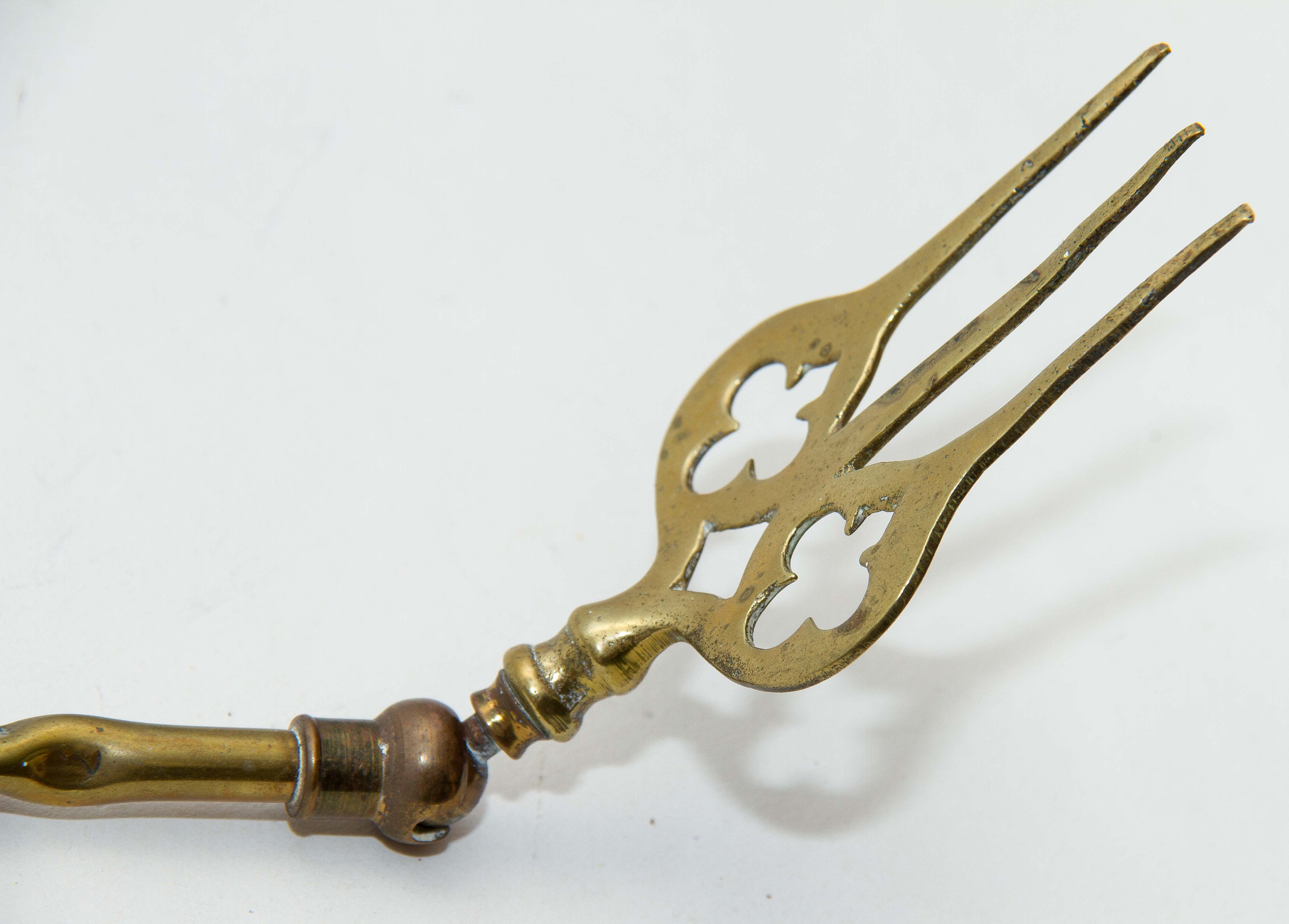 Shanklin, Isle of Wight, England brass toasting fire fork jointed ball moving end long fork Patented Registered design
