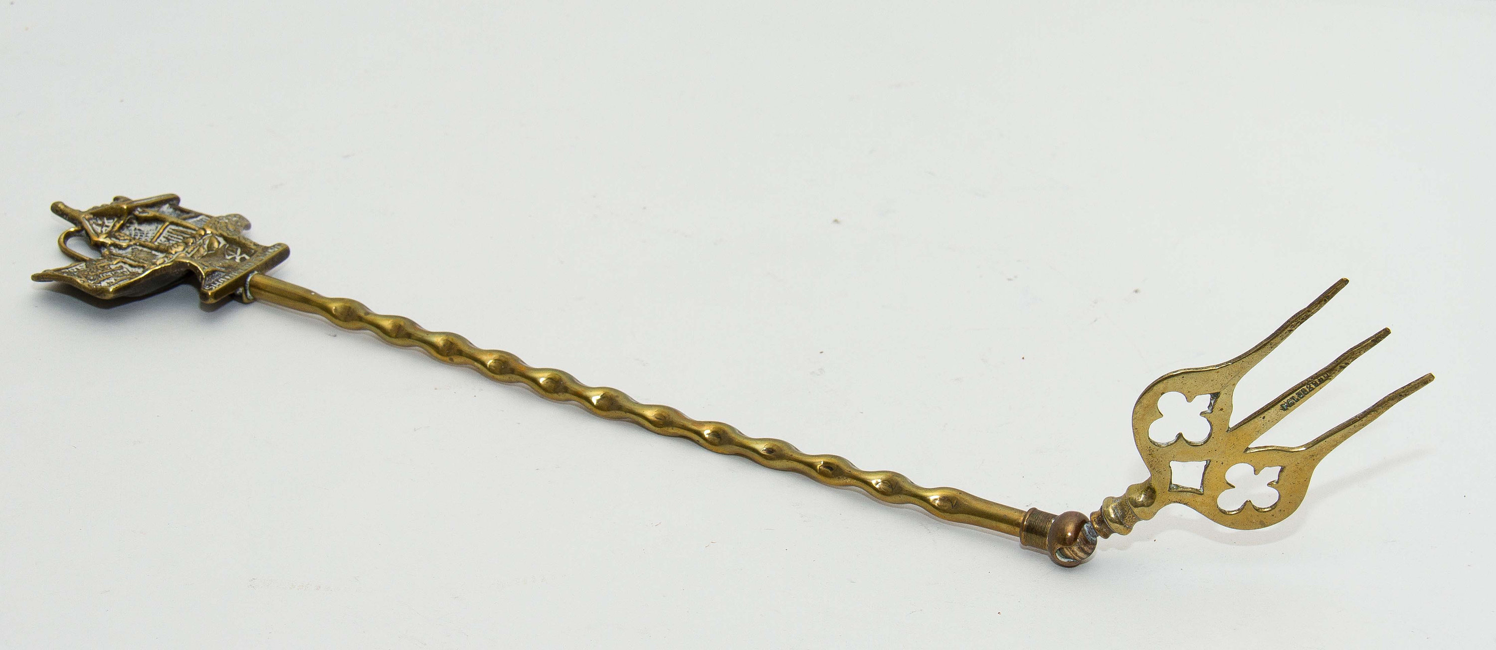 Shanklin, Isle of Wight, England brass toasting fire fork jointed ball moving end long fork Patented Registered design