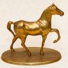 brass horse cantering ornament