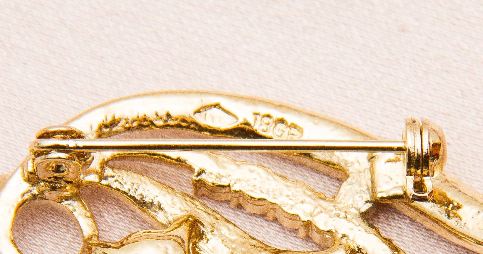 Vintage 18 Carat Gold Plated Pearl and Rhinestone Leaf shape Brooch 18 Carat gold plated vintage brooch in the shape of a leaf