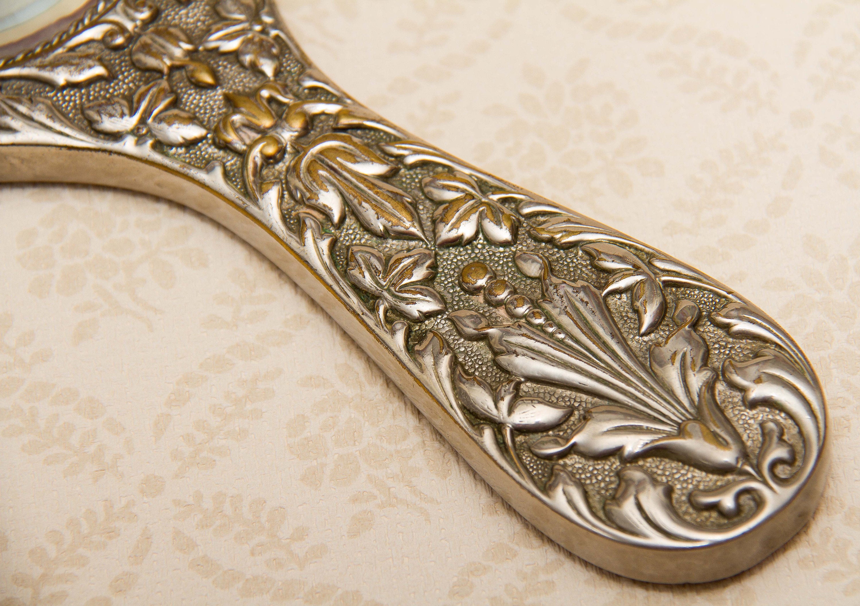 A quality vintage silver plated ornate hand vanity mirror. The mirror is a good weight and has a bevel edge mirror., Vintage Ornate Silver Plated Hand Mirror Vanity beveled edge oval mirror with handle dressing table mirror
