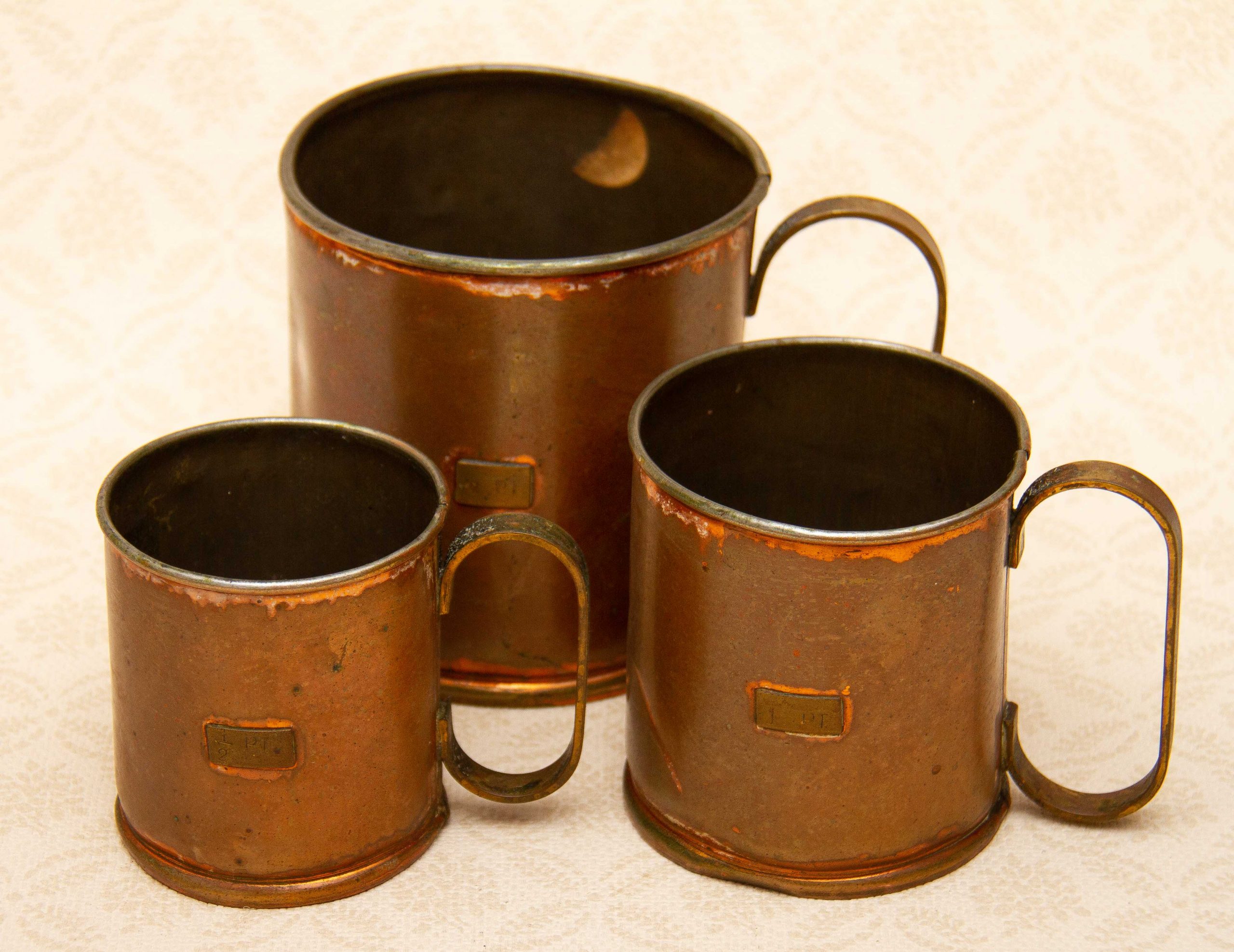 Set of Three Vintage British Copper Measuring Cups With Brass